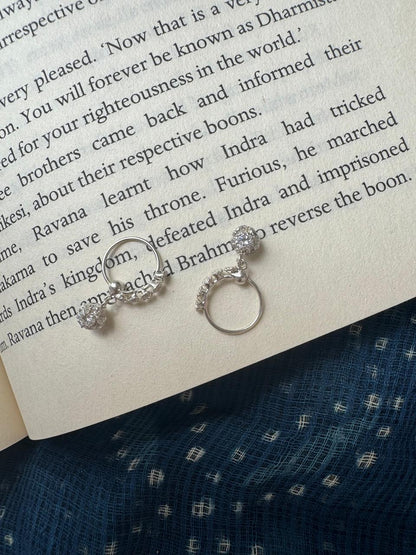 Side view of Chamak Hoops in pure silver with handcrafted detailing