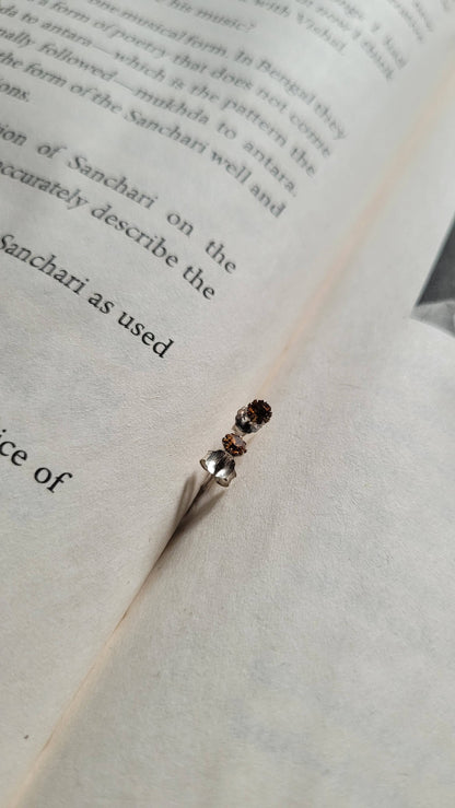 Side view of Chamkeeli Studs in pure silver with handcrafted detailing