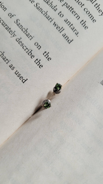 Side view of Chamkeeli Studs in pure silver with handcrafted detailing