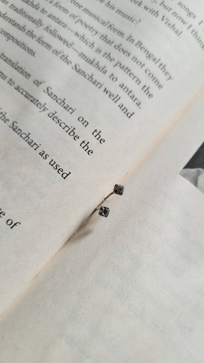 Side view of Chamkeeli Studs in pure silver with handcrafted detailing