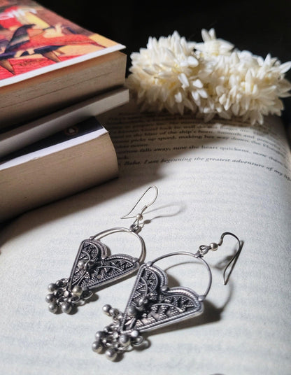 Side view of Charvi Earrings in pure silver with handcrafted detailing