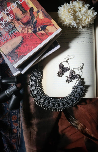 Side view of Charvi Earrings in pure silver with handcrafted detailing