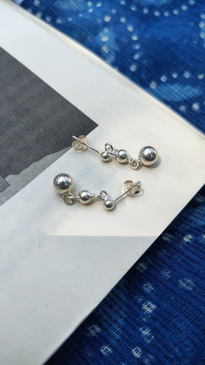Side view of Christmas Lights Earrings in pure silver with handcrafted detailing