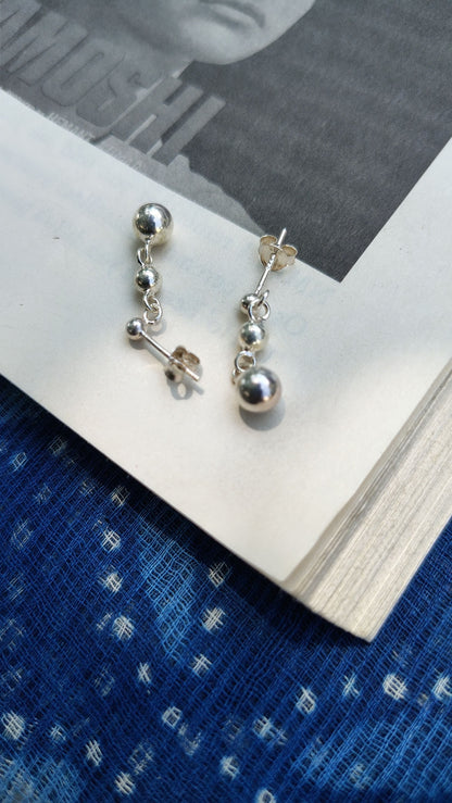 Side view of Christmas Lights Earrings in pure silver with handcrafted detailing
