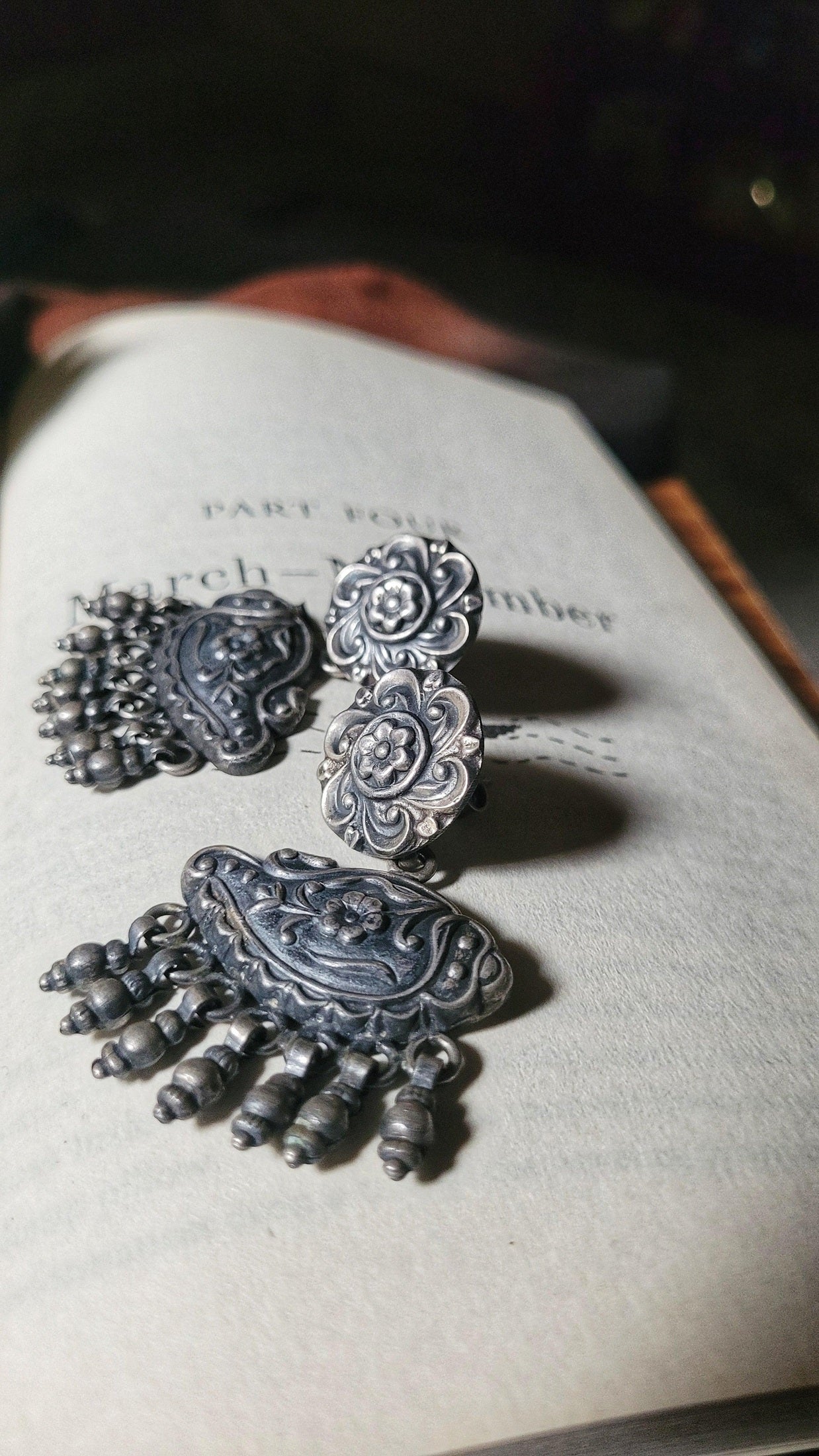 Side view of Deepanshi Earrings in pure silver with handcrafted detailing