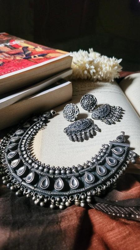 Side view of Deepanshi Earrings in pure silver with handcrafted detailing