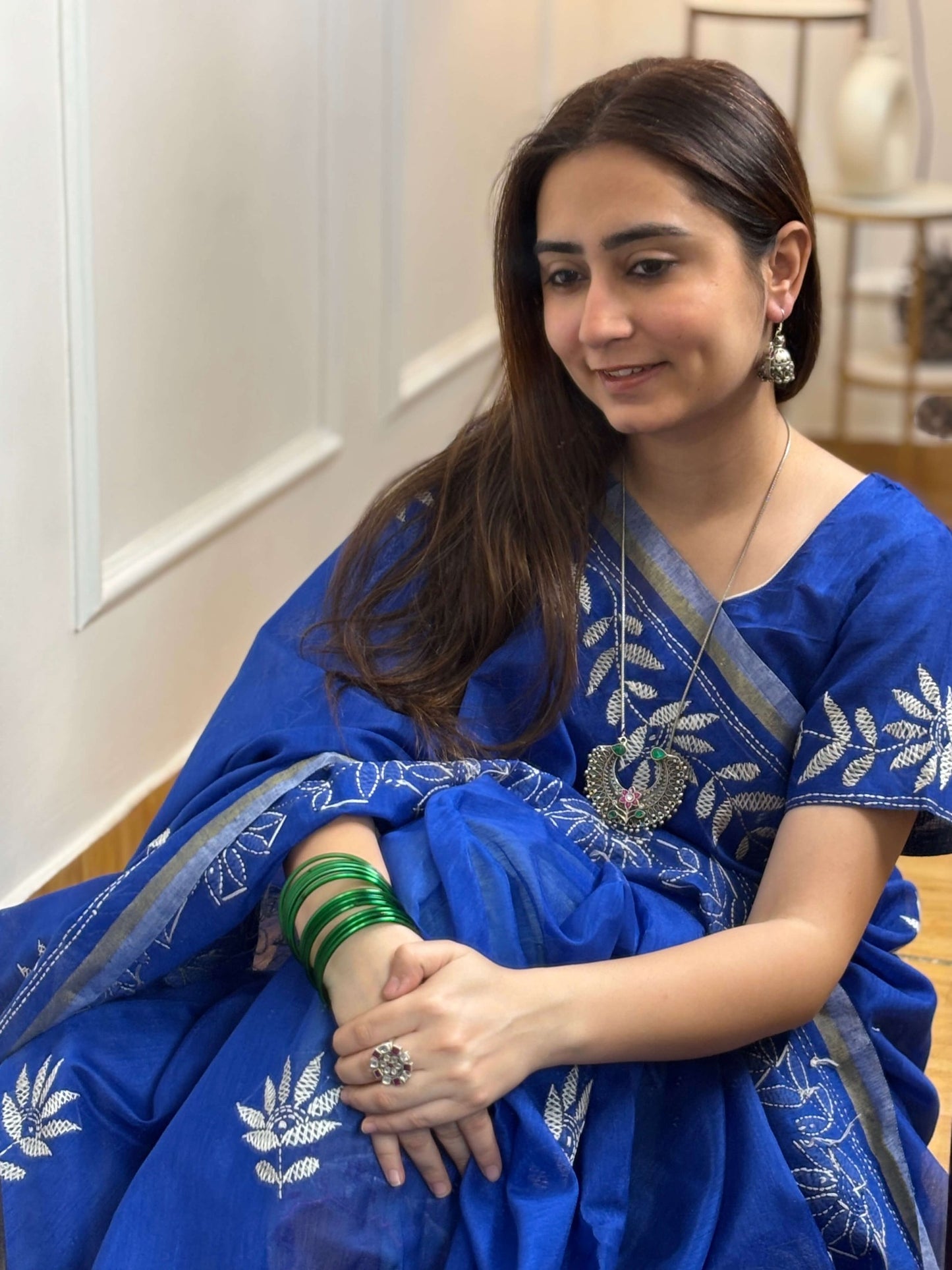 Side view of Pancchi Jhumka in pure silver with handcrafted detailing