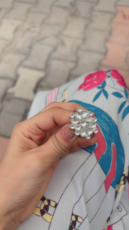 Side view of Devaki Ring in pure silver with handcrafted detailing