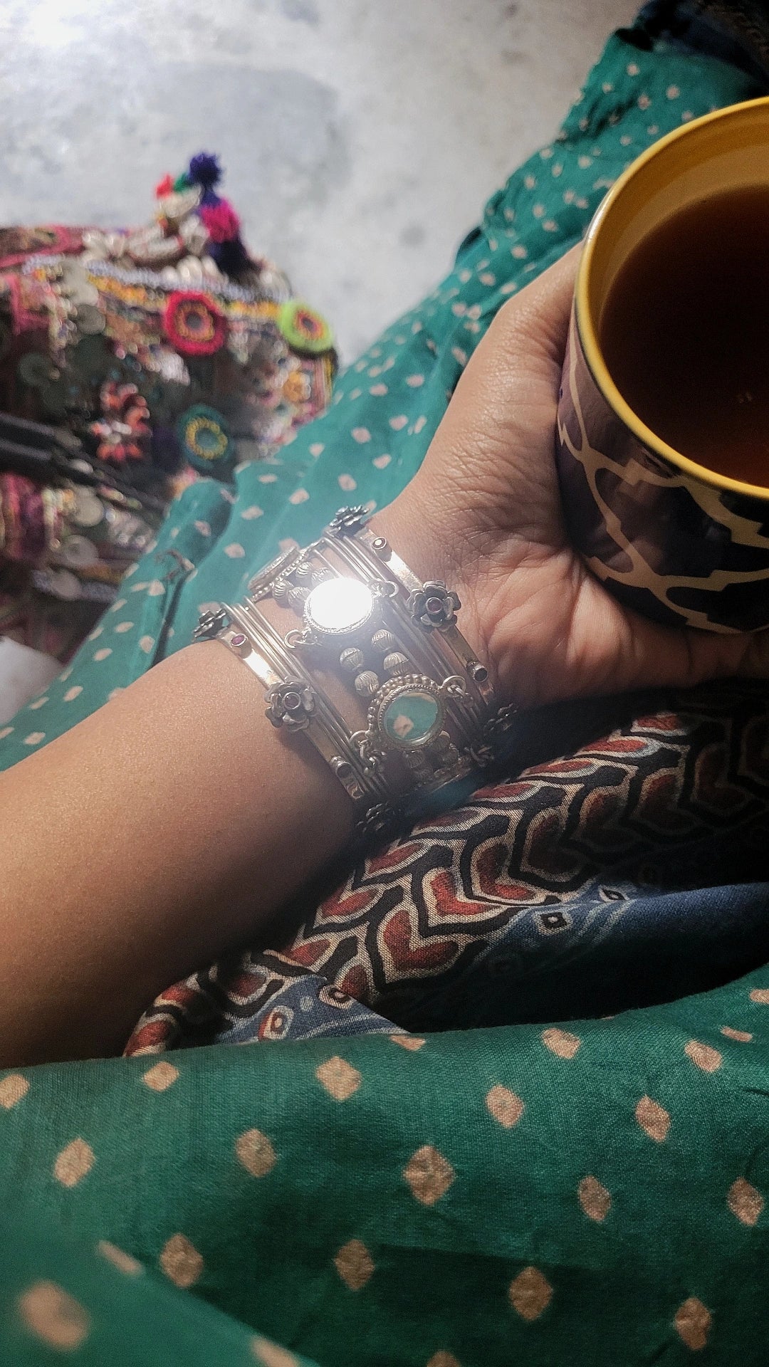 Side view of Kora Bangles in pure silver with handcrafted detailing