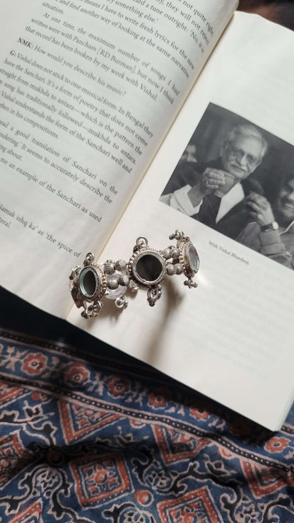 Side view of Dhruvnanda Kada in pure silver with handcrafted detailing