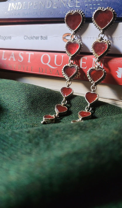Side view of Dil-e-Naadan Earrings in pure silver with handcrafted detailing