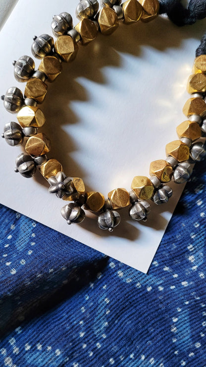 Side view of Durlabh Vintage Necklace in pure silver with vintage detailing