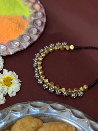 Side view of Durlabh Vintage Necklace in pure silver with vintage detailing