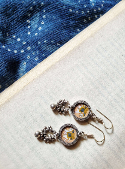 Side view of Ellie Earrings in pure silver with handcrafted detailing