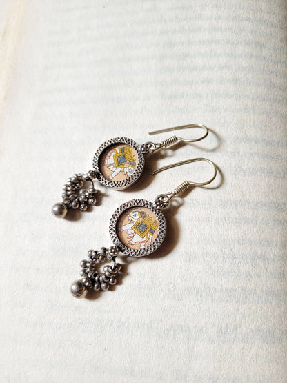 Side view of Ellie Earrings in pure silver with handcrafted detailing