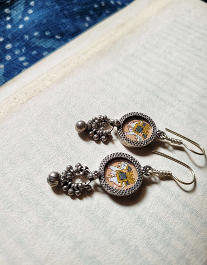 Side view of Ellie Earrings in pure silver with handcrafted detailing