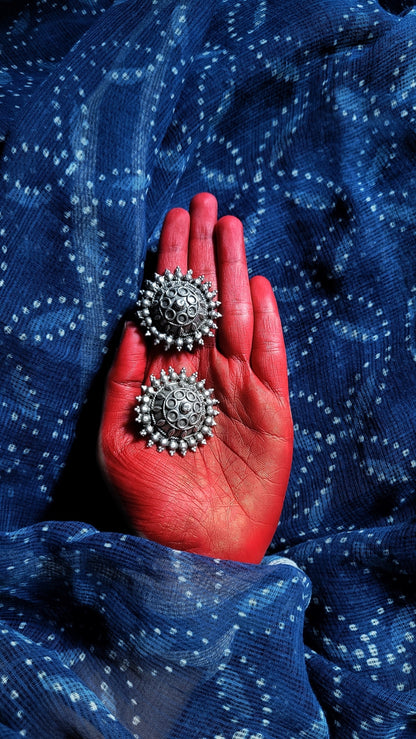 Side view of Gayatri Vintage Earrings in pure silver with vintage detailing