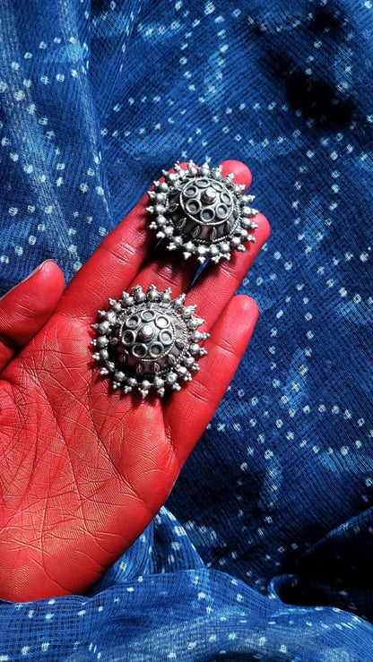 Side view of Gayatri Vintage Earrings in pure silver with vintage detailing