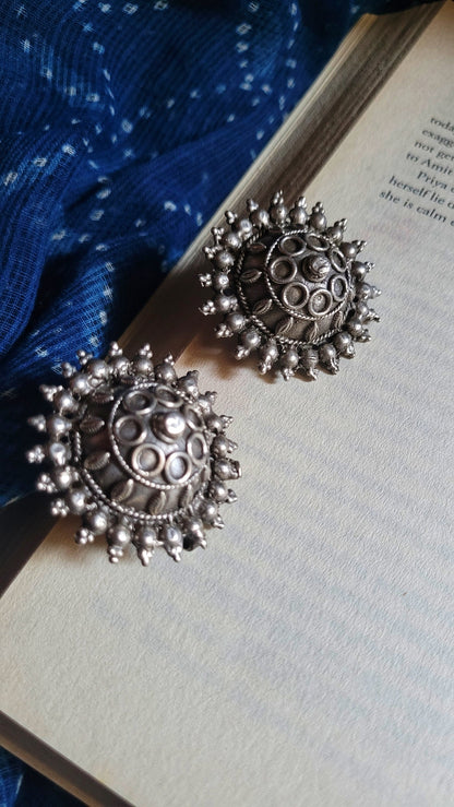 Side view of Gayatri Vintage Earrings in pure silver with vintage detailing