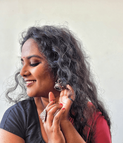 Side view of Gayatri Vintage Ring in pure silver with vintage detailing