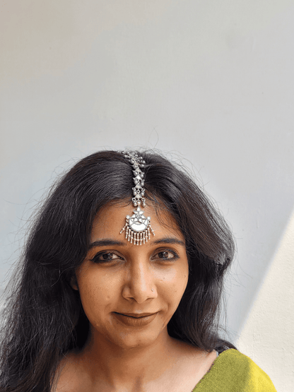 Side view of Hania Maang Tika in pure silver with handcrafted detailing