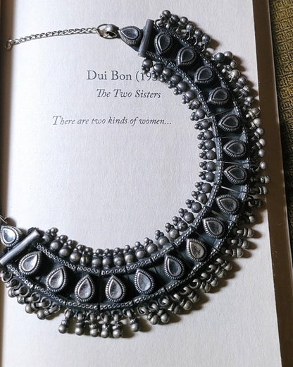 Side view of Hayat Necklace in pure silver with handcrafted detailing