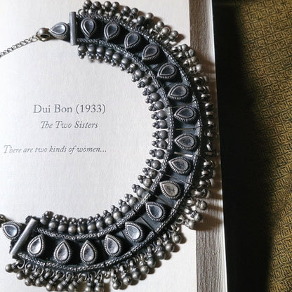 Side view of Hayat Necklace in pure silver with handcrafted detailing