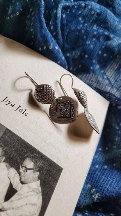 Side view of Hilsa Earrings in pure silver with handcrafted detailing