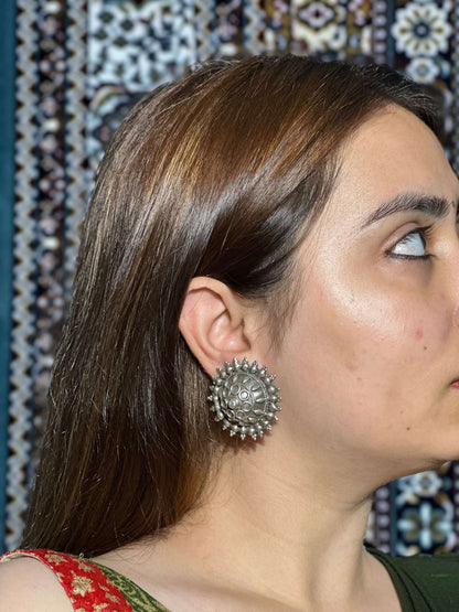 Side view of Gayatri Vintage Earrings in pure silver with vintage detailing