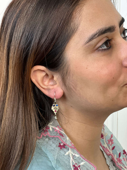Side view of Khushi Vintage Earrings in pure silver with vintage detailing