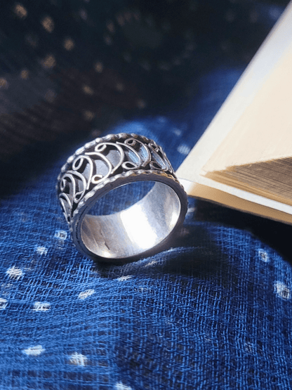 Side view of Icarus Midi Ring in pure silver with handcrafted detailing