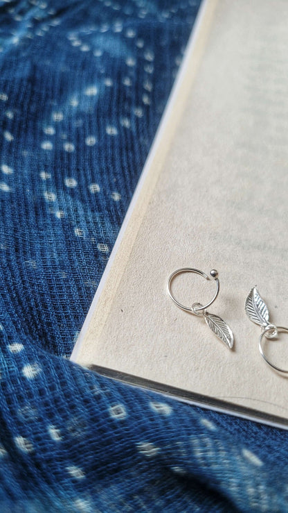 Side view of Ilai Hoops in pure silver with handcrafted detailing