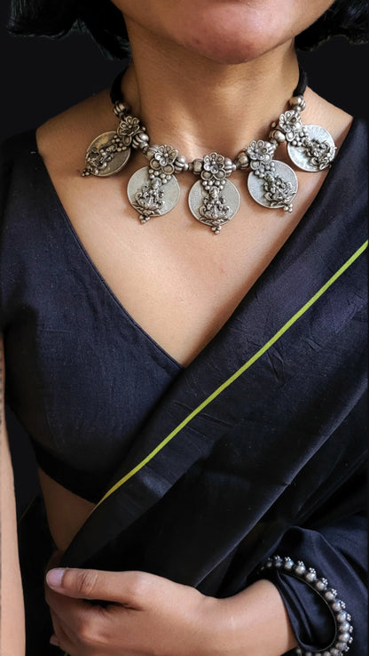 Side view of Indira Vintage Necklace in pure silver with vintage detailing