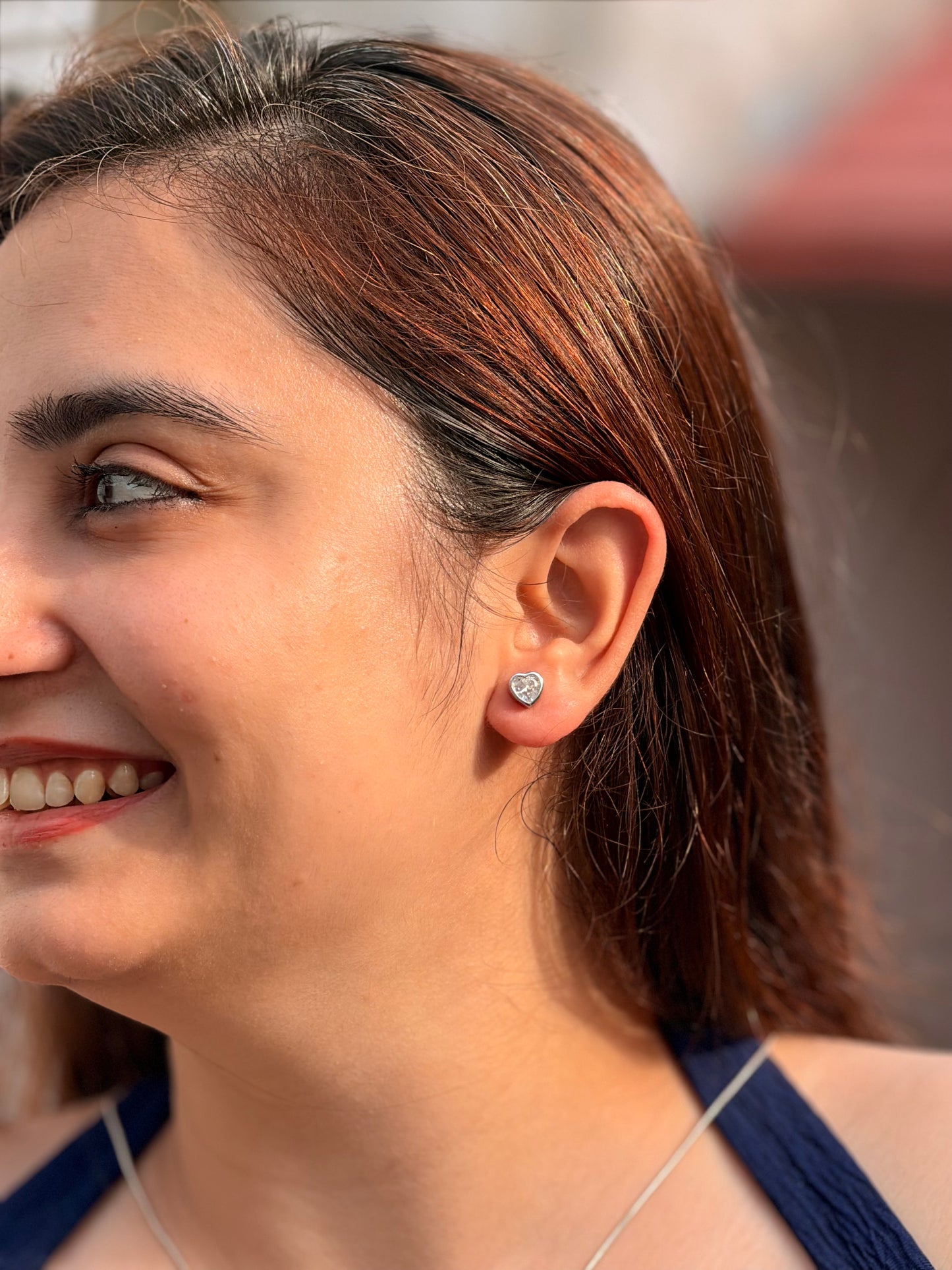 Iqraar Studs worn