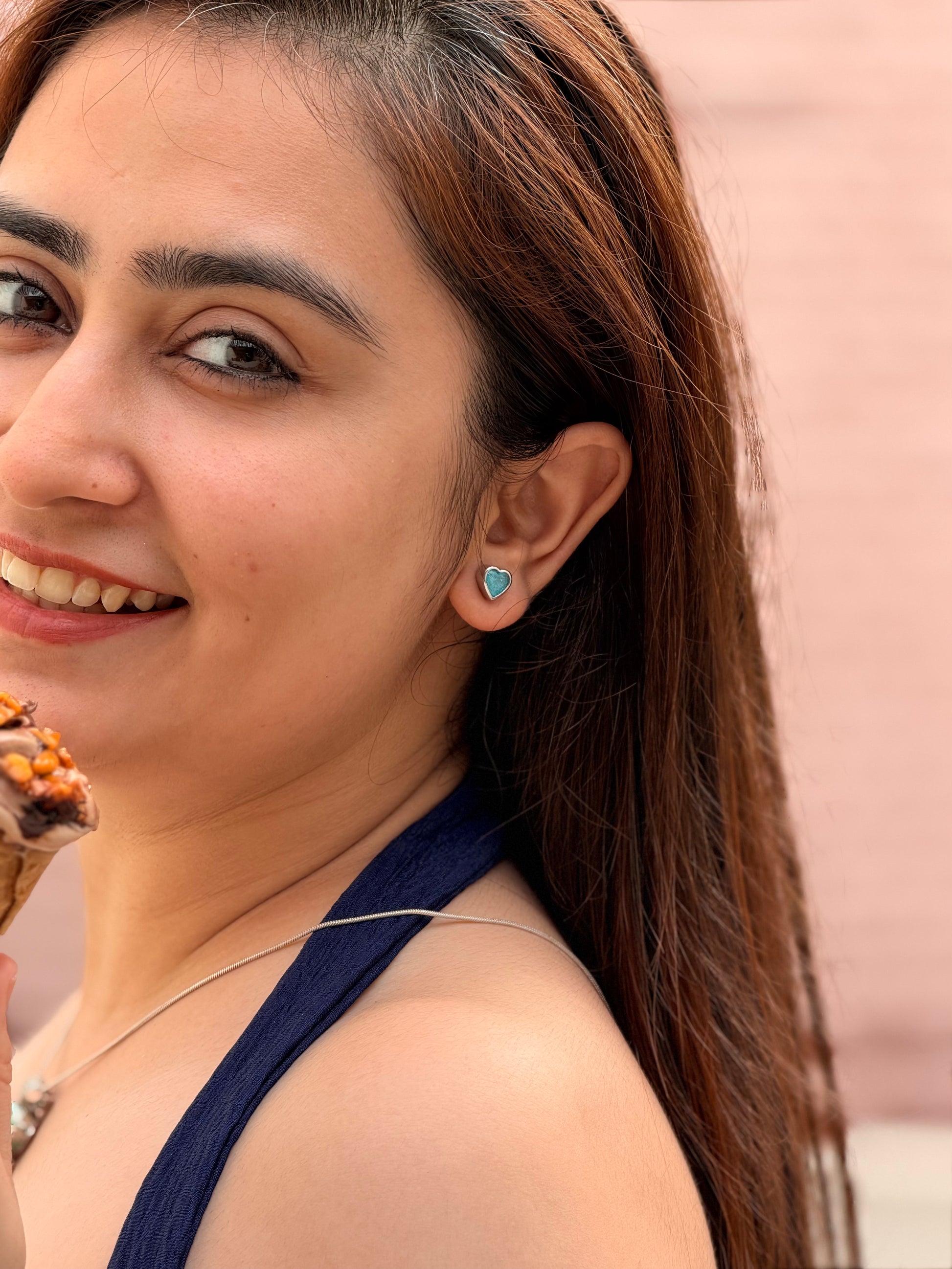 Iqraar Studs worn