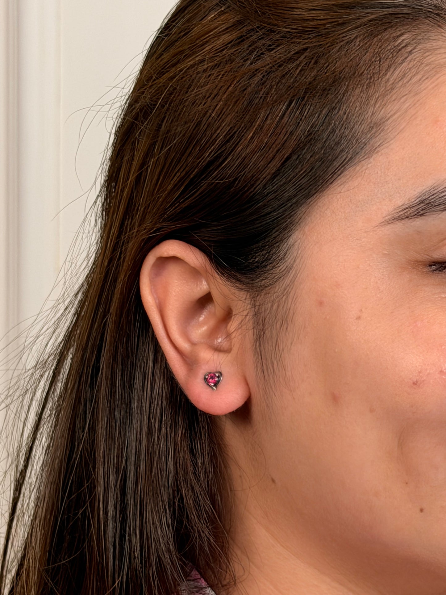 Iqraar Studs worn