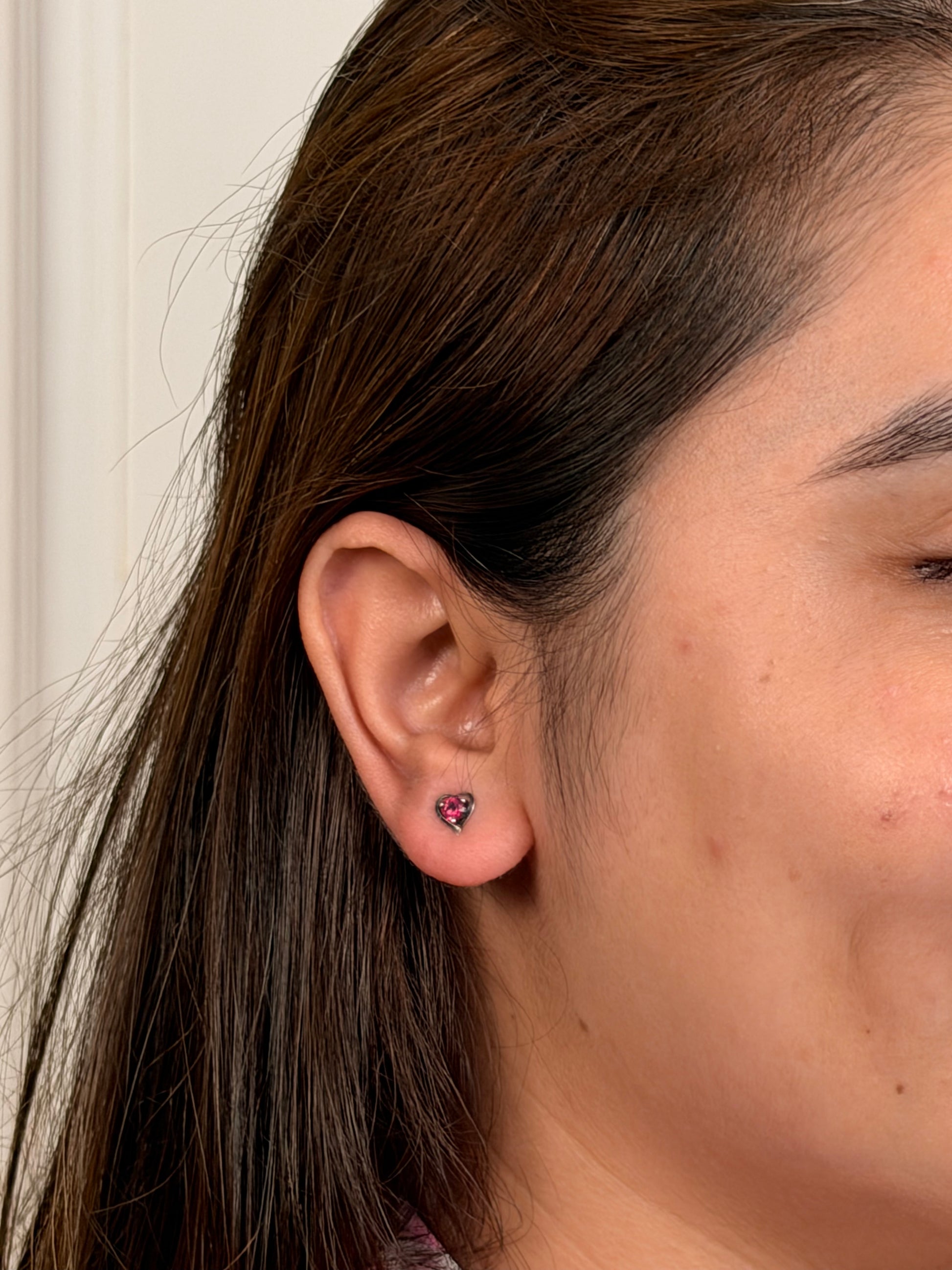 Iqraar Studs worn