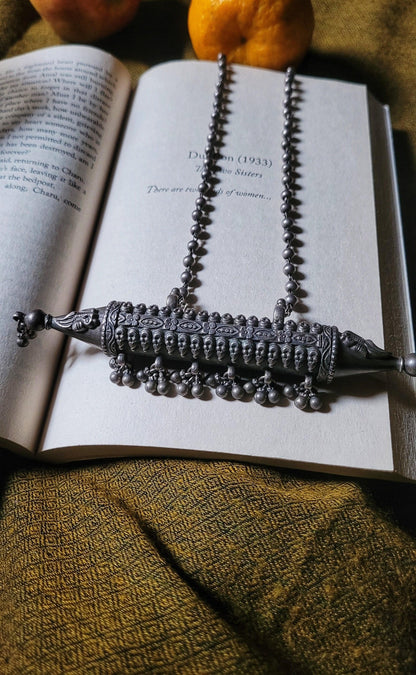 Side view of Ishaanavi Necklace in pure silver with handcrafted detailing