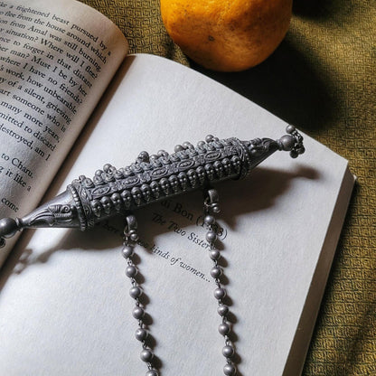 Side view of Ishaanavi Necklace in pure silver with handcrafted detailing