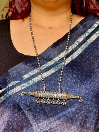 Side view of Ishaanavi Necklace in pure silver with handcrafted detailing