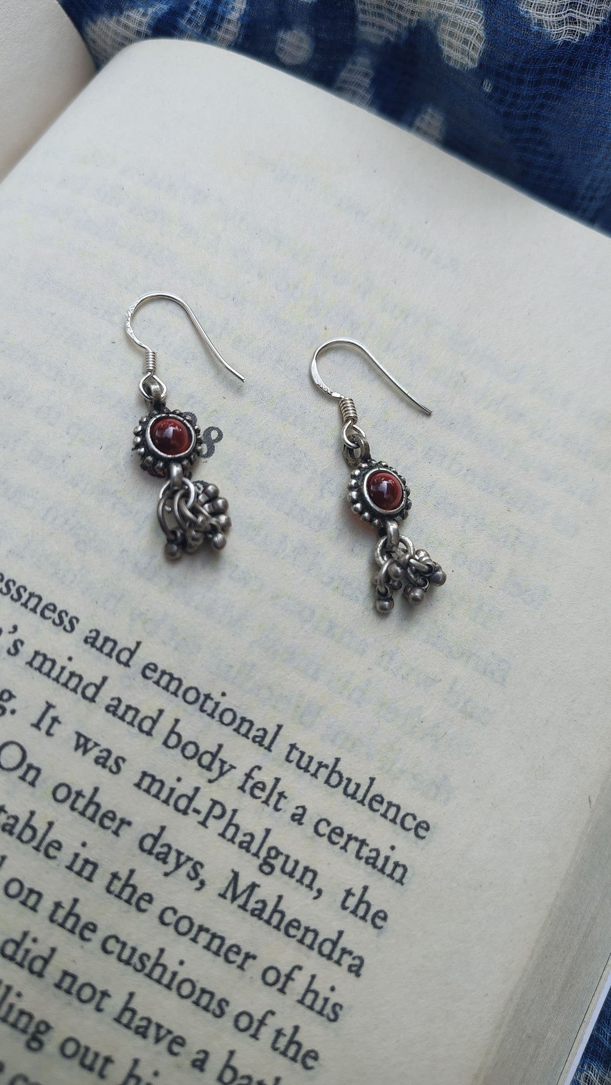 Sadabahaar Jewelry Authentic Vintage Silver Earrings with Red Stone Floral Embossing and Ghungroos for Women - front view