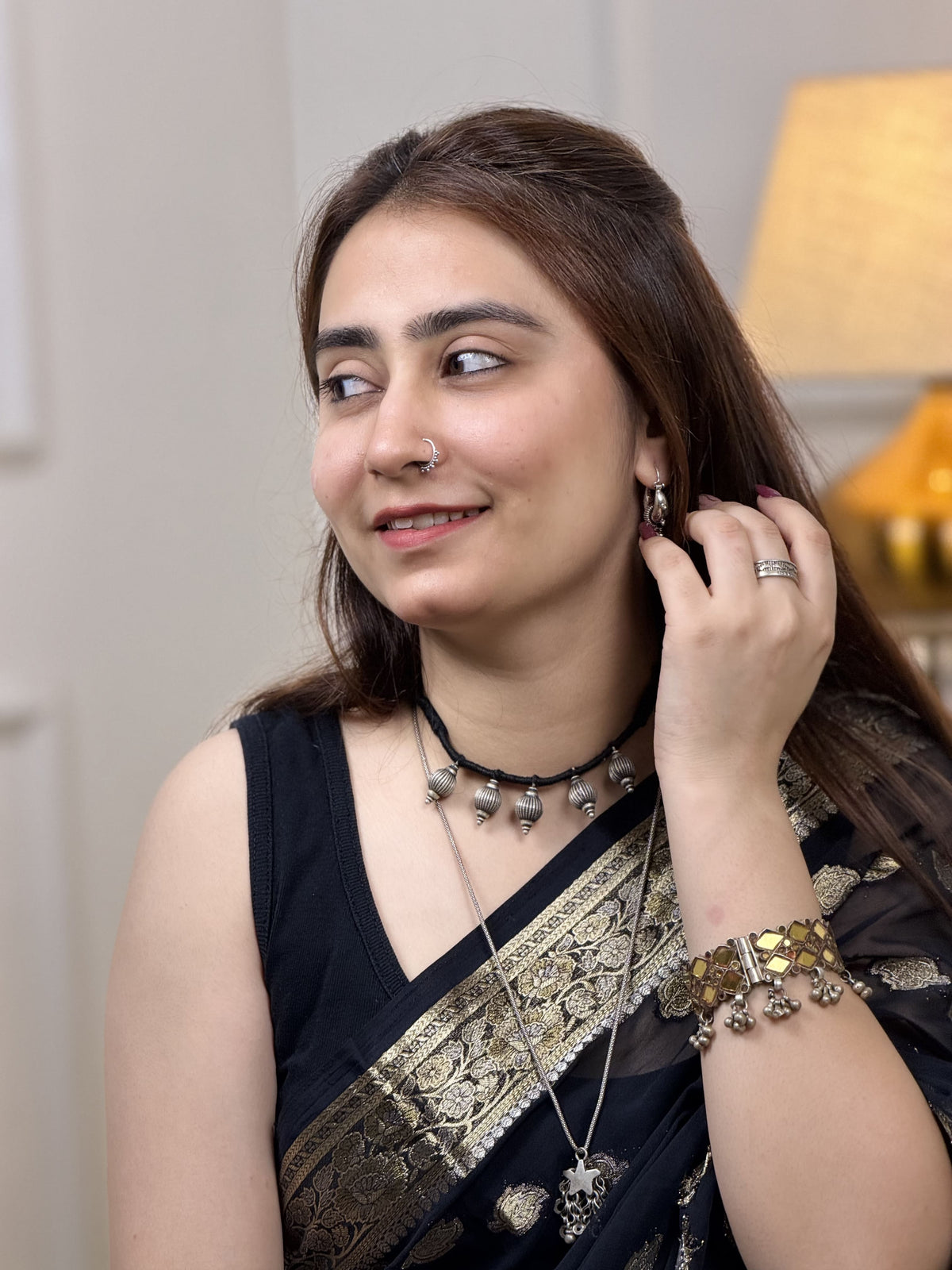 92.5 silver necklace with five 3D kalash-inspired lattoo beads — geometric embossed lines, three raised dots at base — on black dori. Minimalist, sacred-inspired, daily wear. Shop Sadabahaar Jewelry. Front view