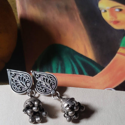Side view of Kalki Jhumka in pure silver with handcrafted detailing