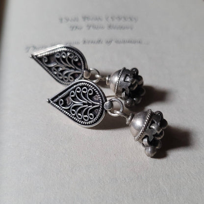 Side view of Kalki Jhumka in pure silver with handcrafted detailing