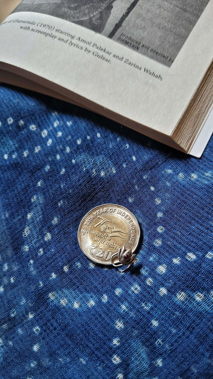 Side view of Kamal Nose-Pin in pure silver with handcrafted detailing
