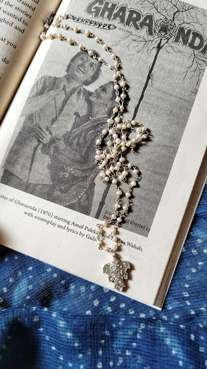 Side view of Katla Pendant in pure silver with handcrafted detailing
