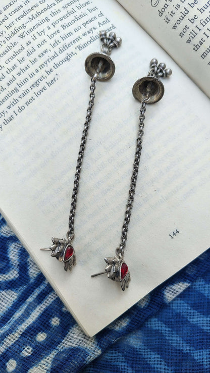 Side view of Kumkum Earrings in pure silver with handcrafted detailing