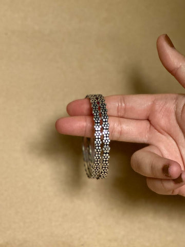 Kusum Bangles in pure silver with handcrafted detailing