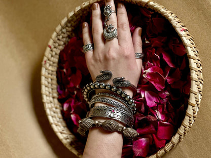 Side view of Lara Kada in pure silver with handcrafted detailing