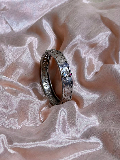 Side view of Lara Kada in pure silver with handcrafted detailing